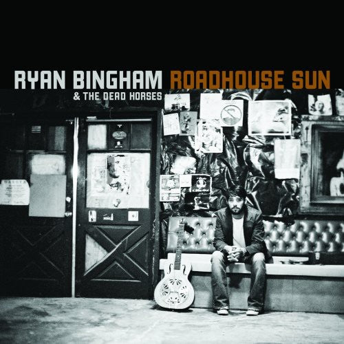the album cover for Ryan Bingham - Roadhouse Sun