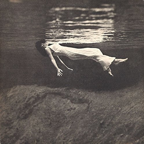 the album cover for Bill Evans / Hall,Jim - Undercurrent