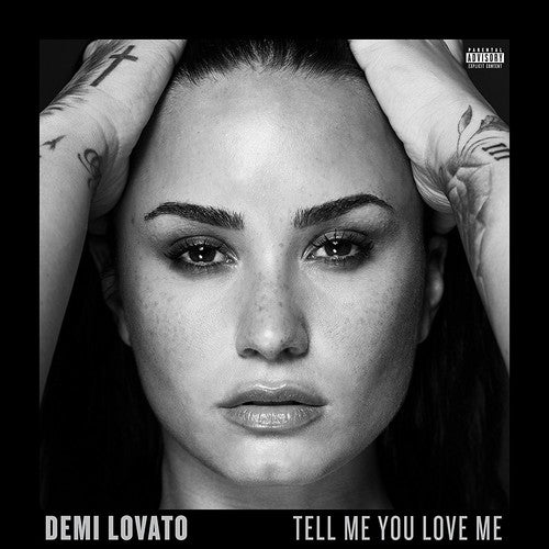 the album cover for Demi Lovato - Tell Me You Love Me