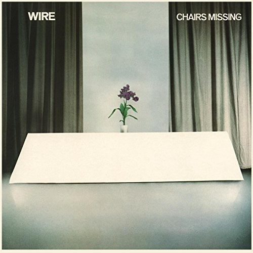 the album cover for Wire - Chairs Missing