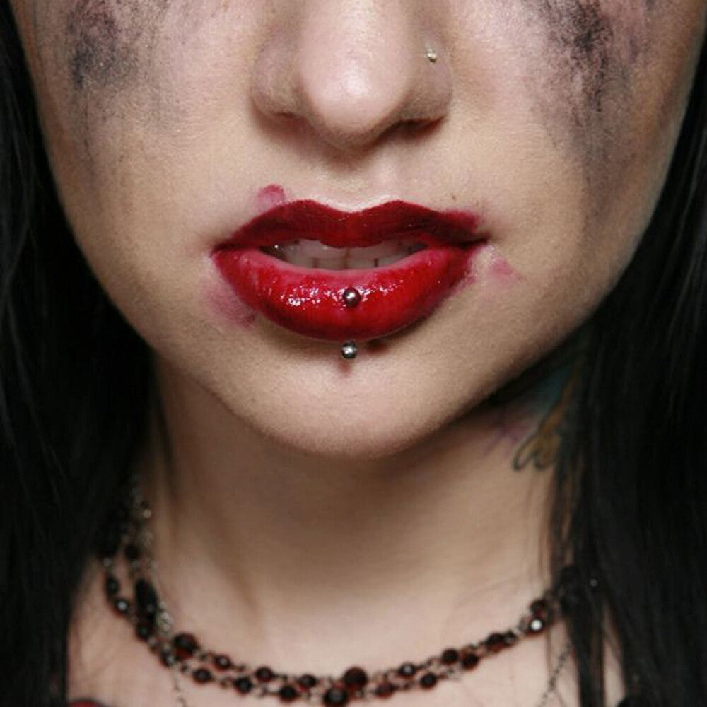 the album cover for Escape The Fate - Dying Is Your Latest Fashion:15th Anniversary Edition [Black LP]