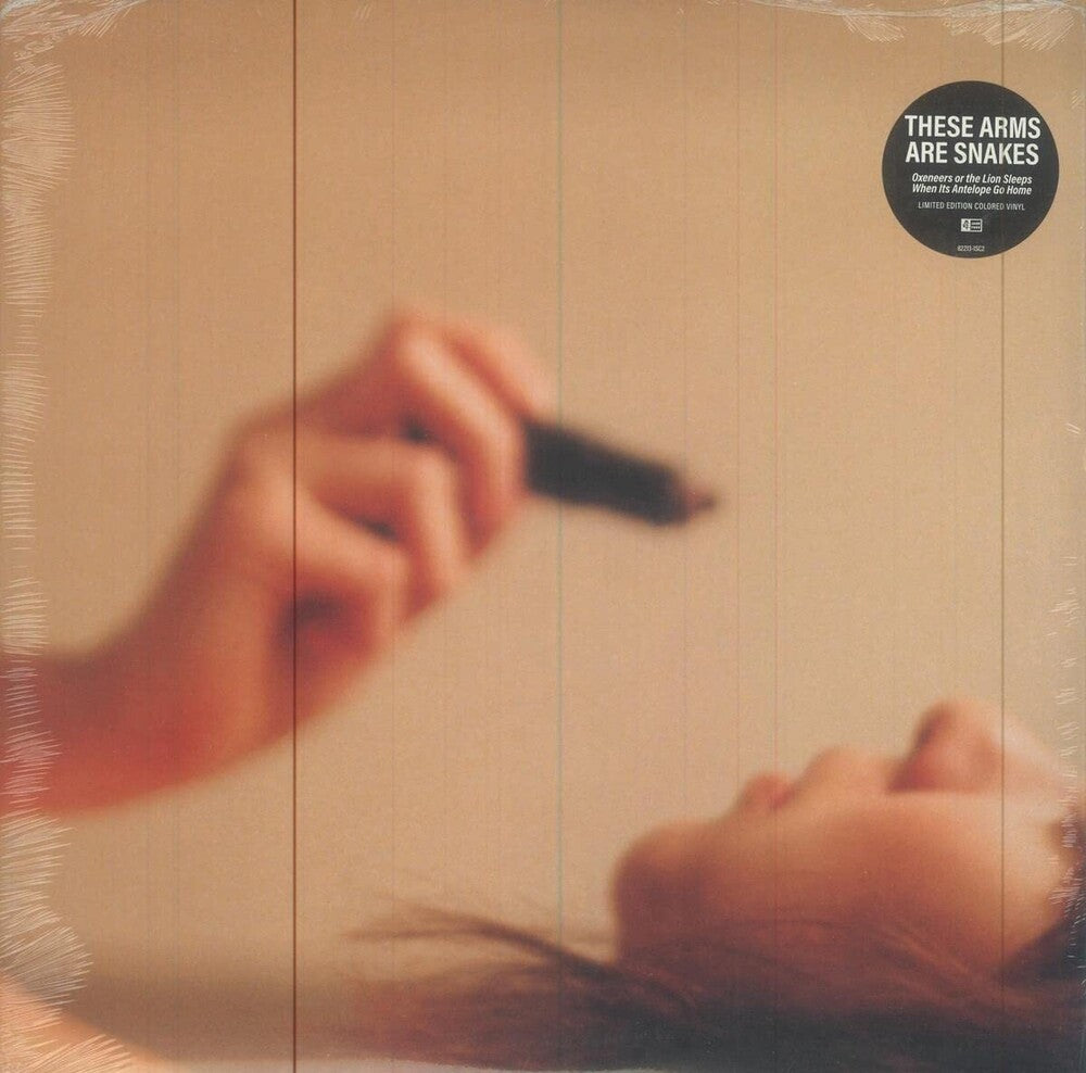 the album cover for These Arms Are Snakes - Oxeneers Or The Lion Sleeps When Its Antelope Go Home [Indie Exclusive Limited Edition Orange LP]