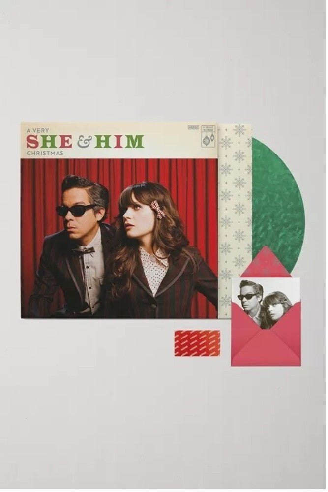 the album cover for She & Him - Very She & Him Christmas - Translucent Green (Grn)