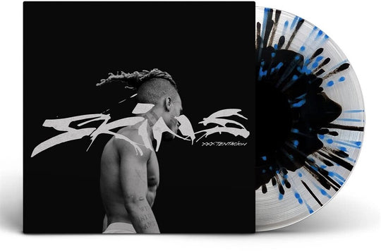 the album cover for XXXTentacion - Skins - Color In Color W/Splatter (Blk) (Blue)