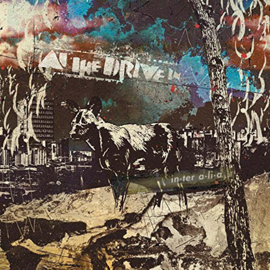 the album cover for At The Drive-In - In.Ter A.Li.A [Colored Vinyl] (Red) (Hol)