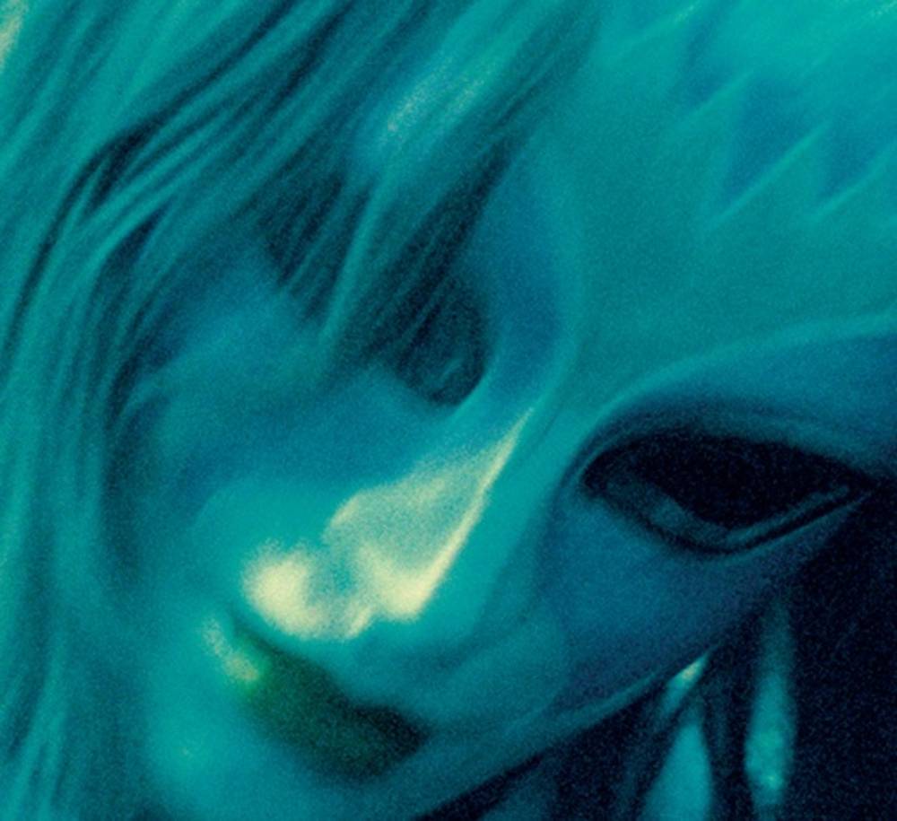 the album cover for Dizzy - Dizzy [Indie Exclusive Limited Edition Transparent Sea Blue LP]