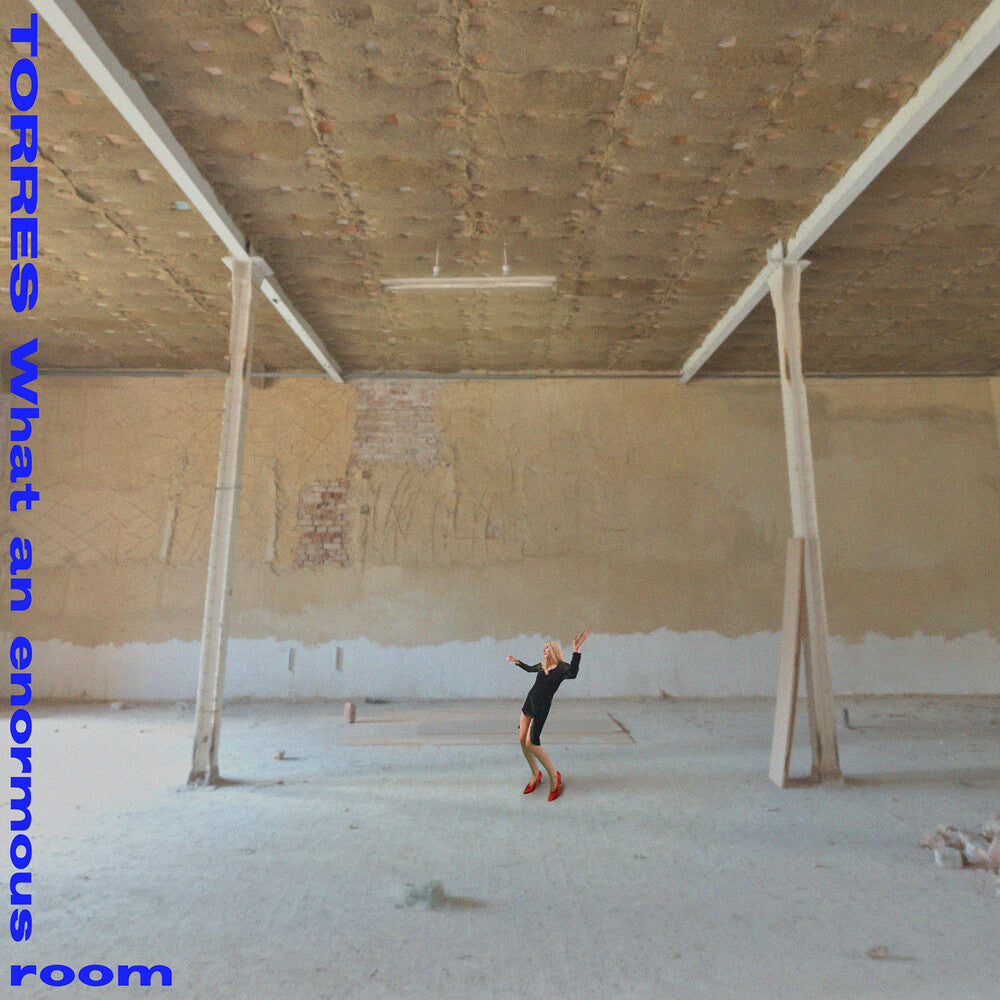 the album cover for Torres - What An Enormous Room [Indie Exclusive] (Blue) [Limited Edition] (Wht)