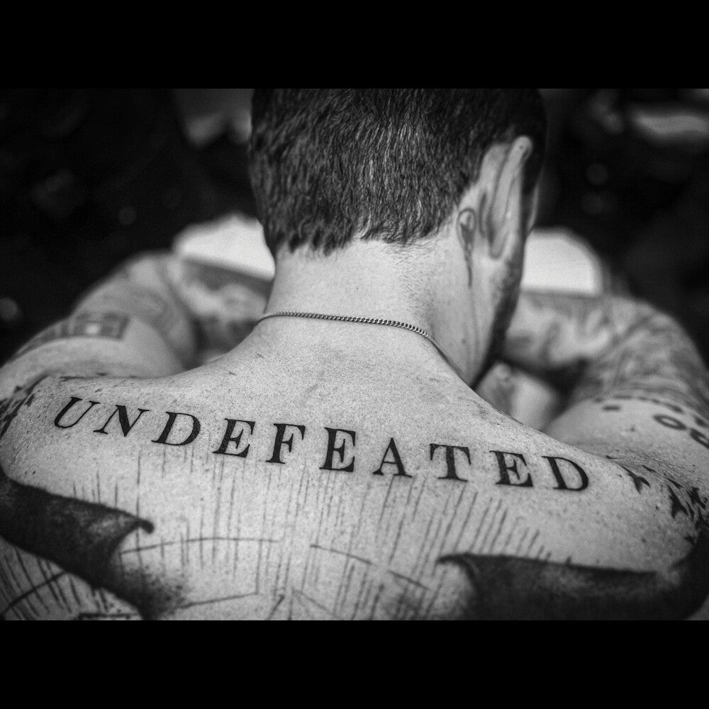 the album cover for Frank Turner - UNDEFEATED [LP]