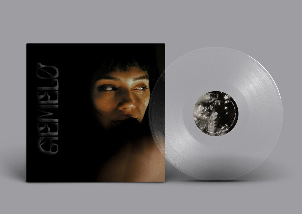 the album cover for Angelica Garcia - Gemelo [Transparent Clear LP]