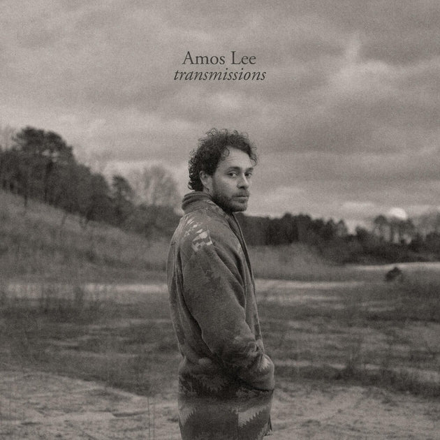 the album cover for Amos Lee - Transmissions [Translucent Sea Blue LP]