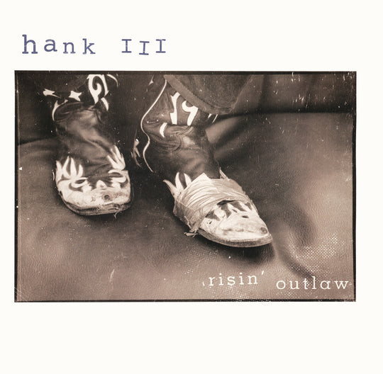 the album cover for Williams Hank Iii - Risin' Outlaw (25th Anniversary Edition) [Colored Vinyl]