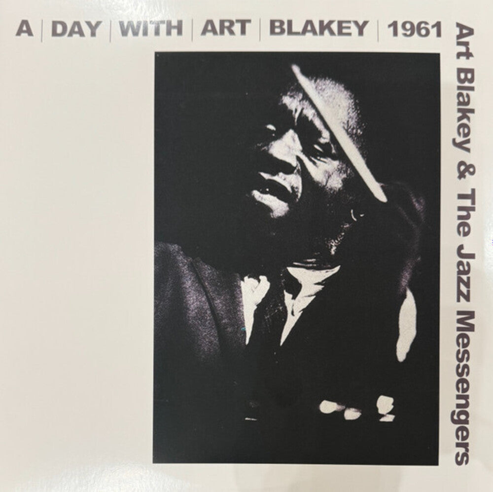 the album cover for Art Blakey &amp; The Jazz Messengers - A Day With Art Blakey 1961 [RSD Essential Indie Exclusive Metallic Silver ]