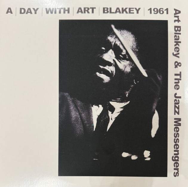 the album cover for Art Blakey &amp; The Jazz Messengers - A Day With Art Blakey 1961 [RSD Essential Indie Exclusive Metallic Silver ]