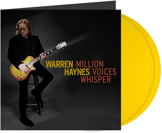 the album cover for Warren Haynes - Million Voices Whisper [Indie Exclusive Opaque Canary Yellow 2LP]