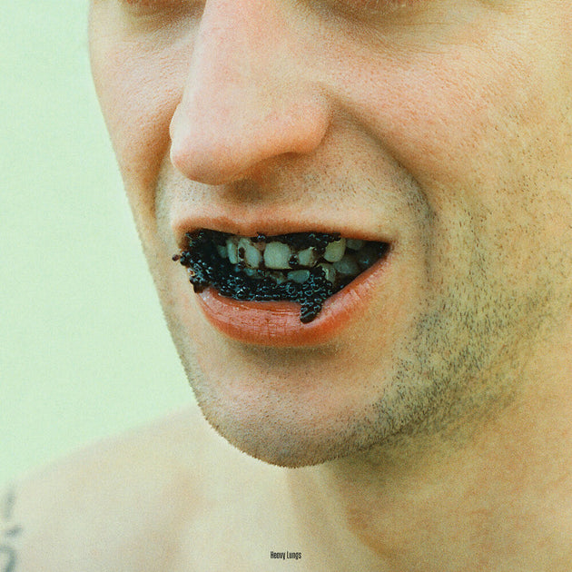 the album cover for Heavy Lungs - Caviar