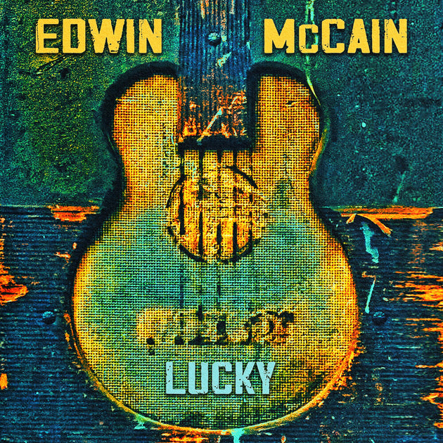 the album cover for Edwin Mccain - Lucky