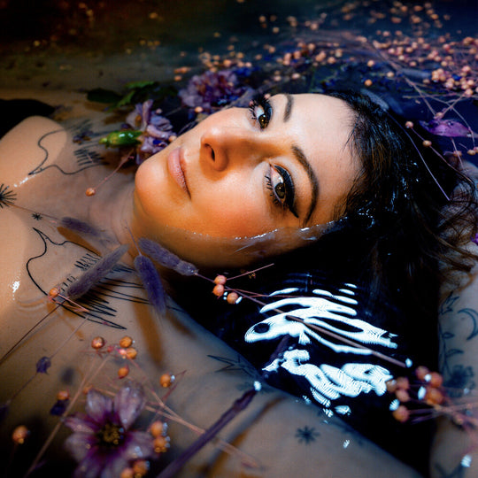 the album cover for Rebecca Vasmant - Who We Are Becoming