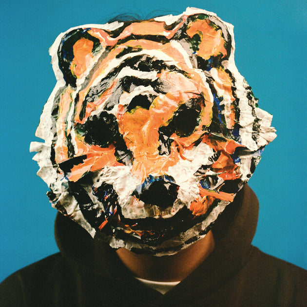 the album cover for Don Glori - Paper Can't Wrap Fire