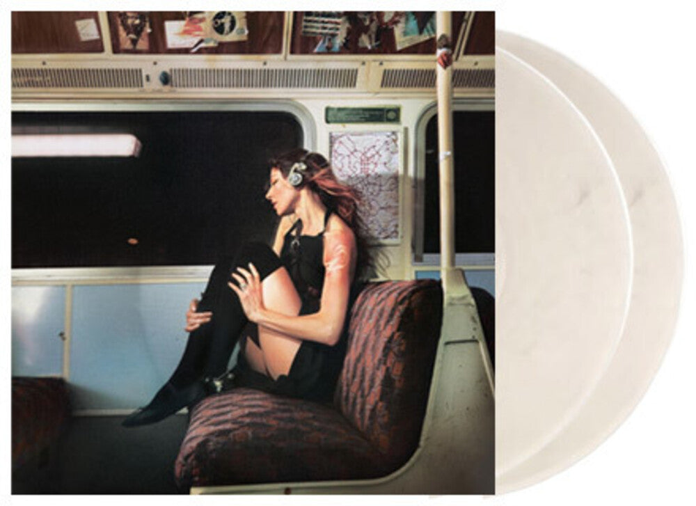 the album cover for Caroline Polachek - Desire, I Want To Turn Into You: Everasking Edition [Deluxe Translucent Milky Clear LP]