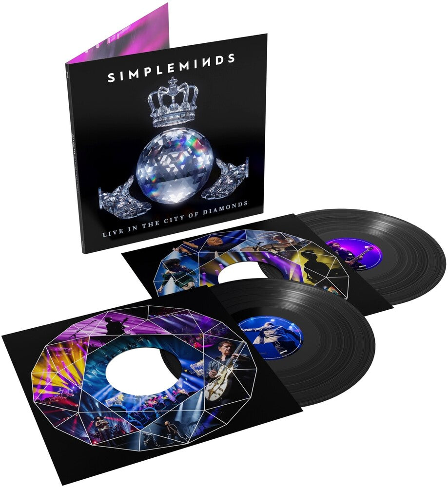 the album cover for Simple Minds - Live In The City Of Diamonds