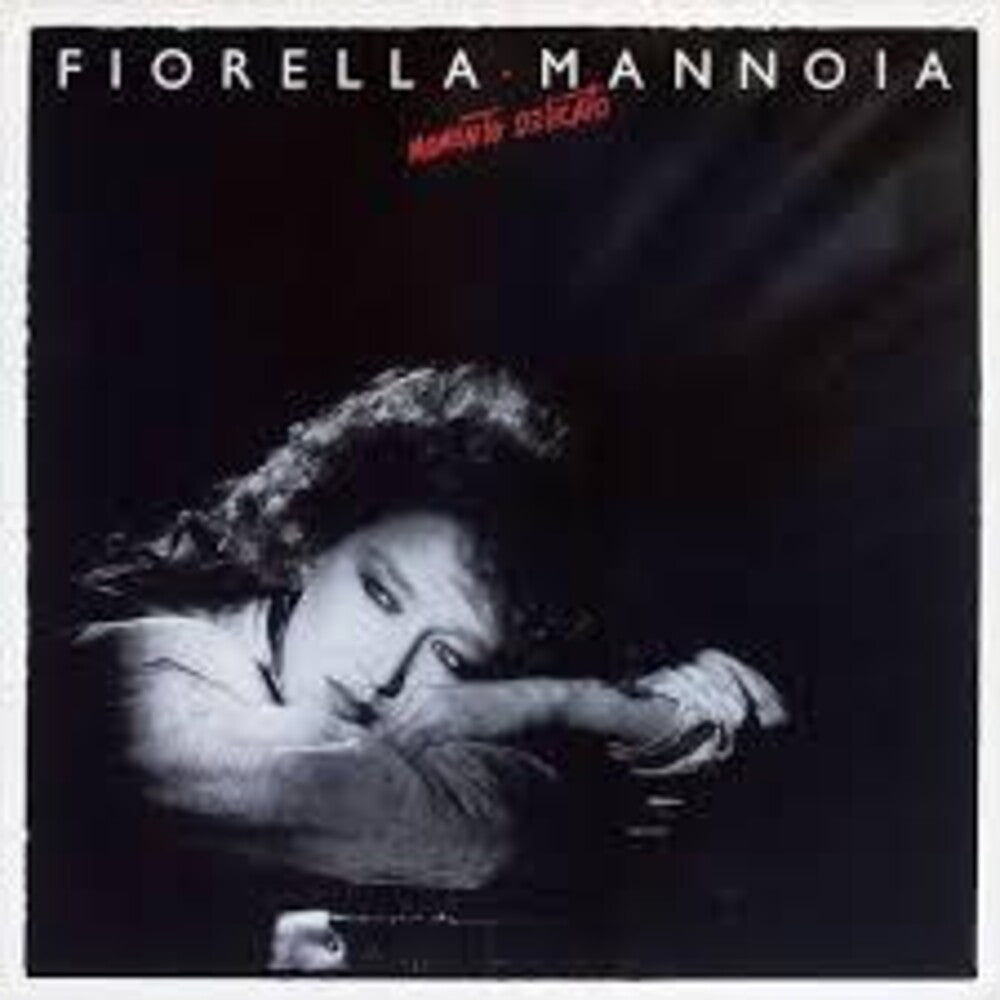 the album cover for Fiorella Mannoia - Momento Delicato [Colored Vinyl] [Limited Edition] [180 Gram] (Red) (Ita)