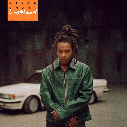 the album cover for Short, Silas - Lushland [INDIE EXCLUSIVE, ORANGE VINYL]