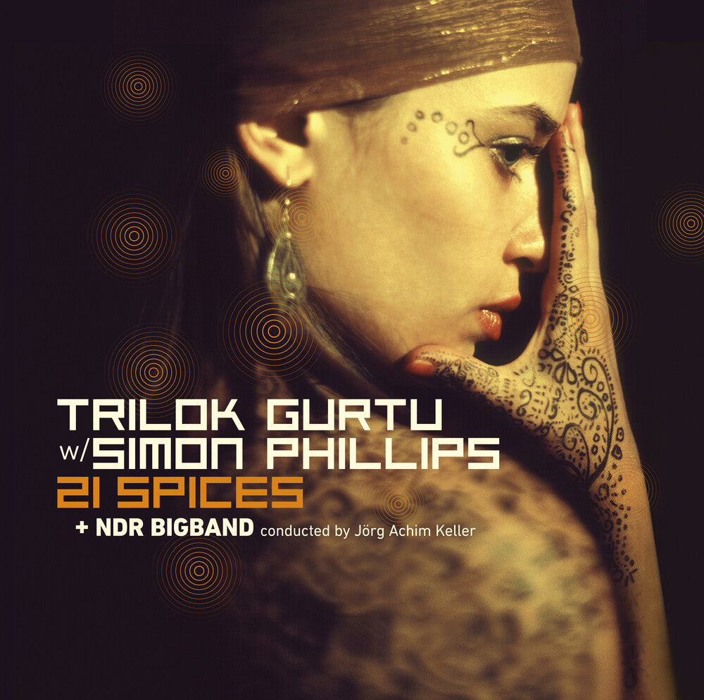 the album cover for Trilok Gurtu  / Phillips,Simon / Ndr Bigband - 21 Spices [Colored Vinyl] [Limited Edition]