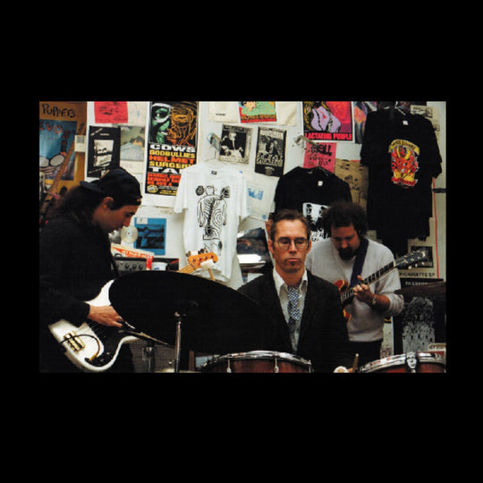 the album cover for Sun City Girls - Extra-Sensory Defection / Graverobbing in the Future