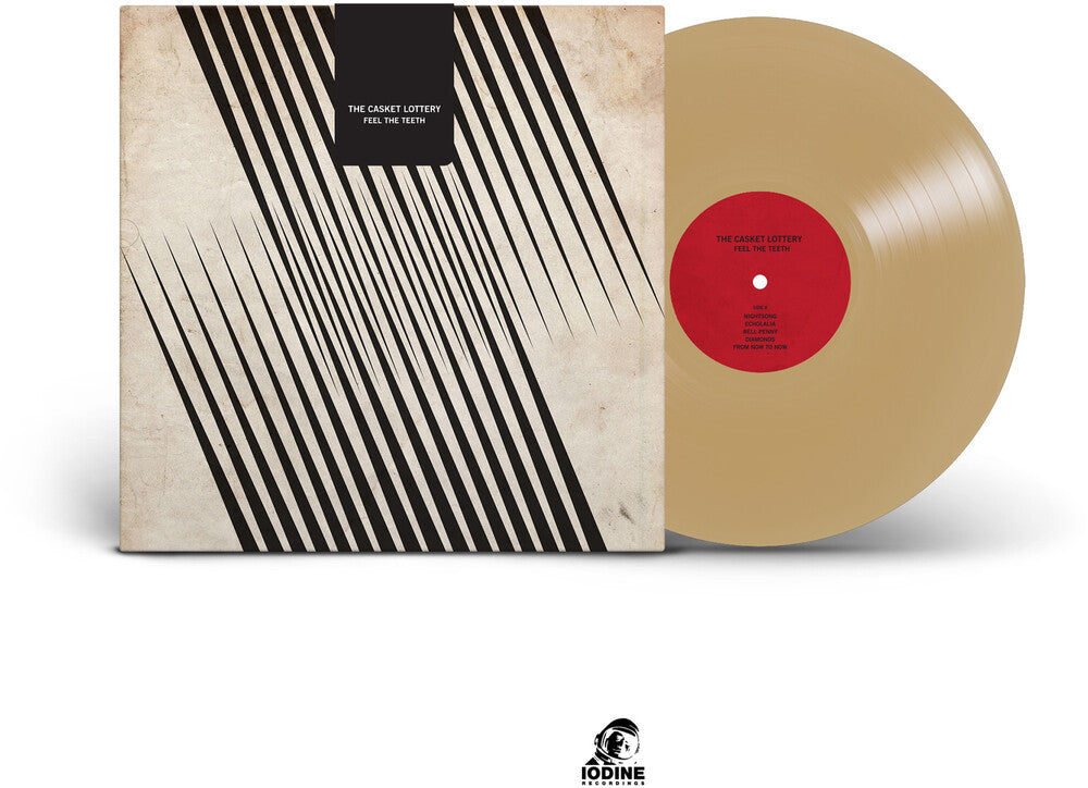 the album cover for Casket Lottery - Feel The Teeth [Colored Vinyl]