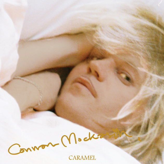 the album cover for Connan Mockasin - Caramel - Metallic Gold [Colored Vinyl] (Gol)