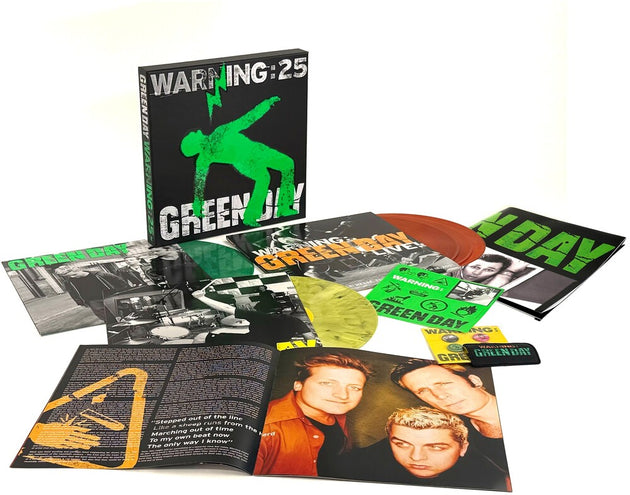 the album cover for Green Day - Warning (25th Anniversary Deluxe Edition) [Green, Yellow, and Orange LP]